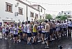Más de un centenar de personas tiznadas y empapadas perpetúan el recuerdo a los carboneros en las fiestas de San Bartolomé
